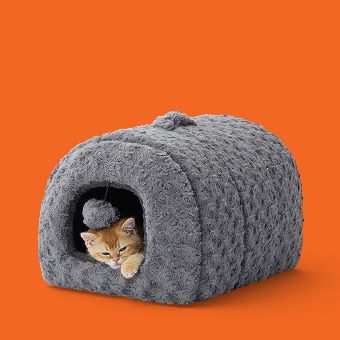 Cat lying in a Whisker City Fur Hideaway Bed