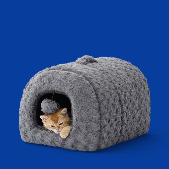 Cat lying in a Whisker City Fur Hideaway Bed