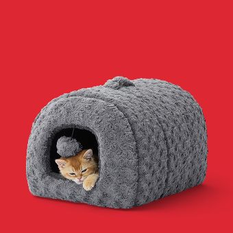 Cat lying in a Whisker City Fur Hideaway Bed