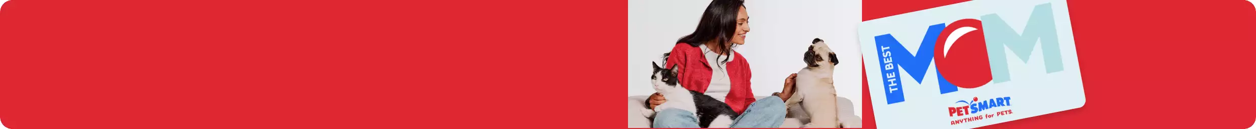Woman sitting on a couch with a dog and a cat and a PetSmart Mother's Day gift card