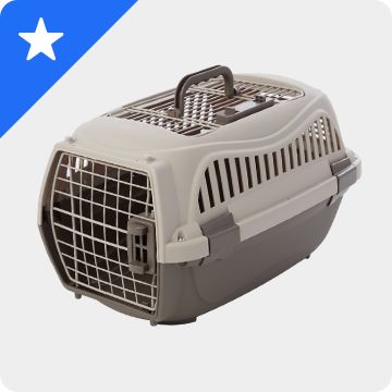 White star graphic on a blue background & a plastic kennel
