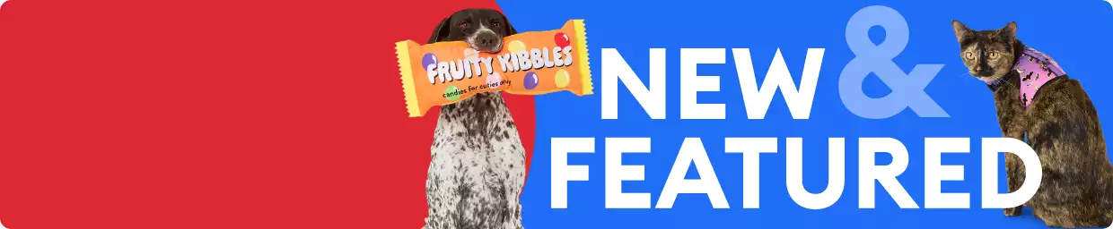 Red & blue banner: "New & Featured" with image of dog chewing candy-shaped toy & cat wearing Halloween print harness