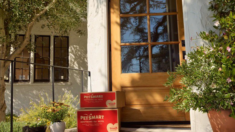 PetSmart delivery boxes placed outside front door of home