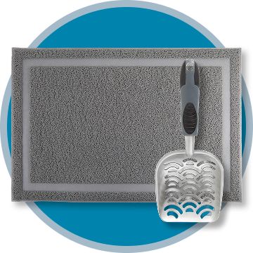 Litter mat and scoop with a blue background