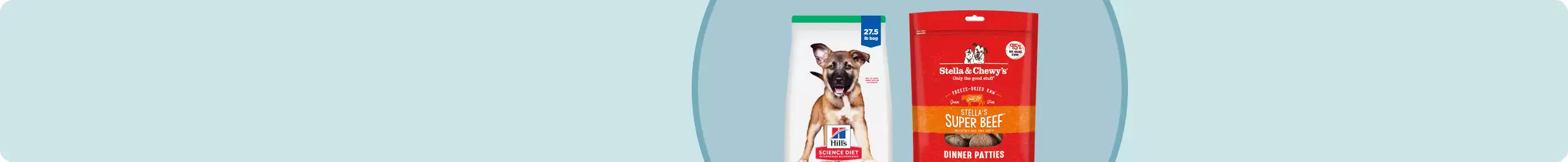 Two large bags of dog food: Hill's Science Diet Large Breed puppy and Stella & Chewy's Super Beef