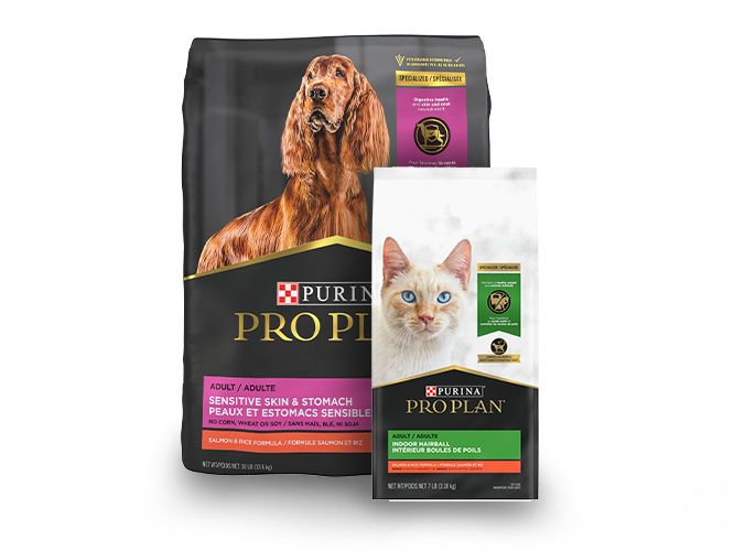 two purina pro plan bags of food