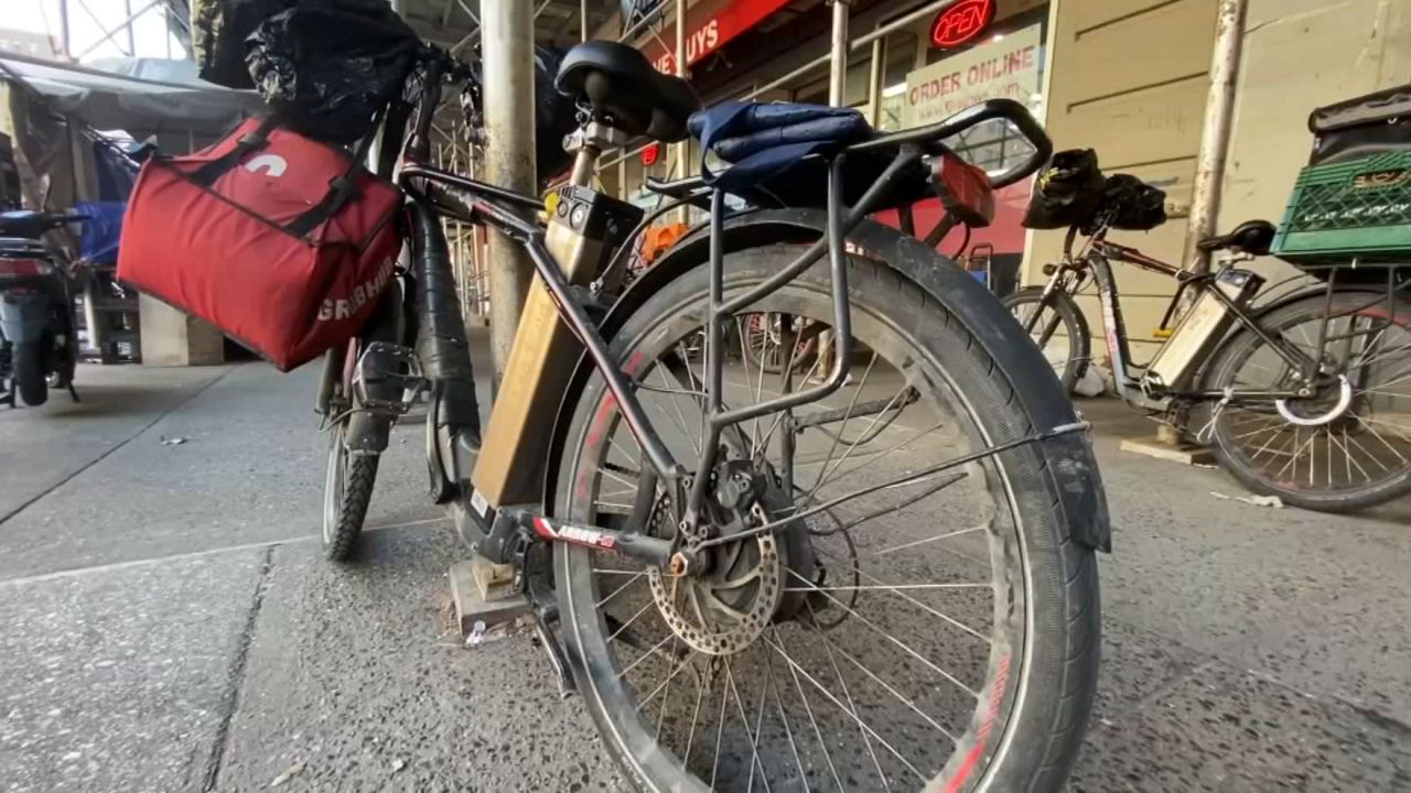 Property owners and tenants will soon be permitted to install battery swapping and charging cabinets on sidewalks in front of their properties. (Spectrum News NY1)