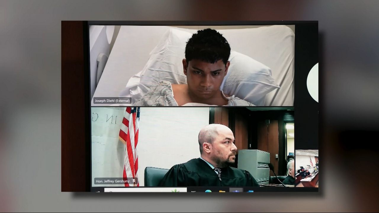 Man accused of shooting 2 NYPD officers arraigned