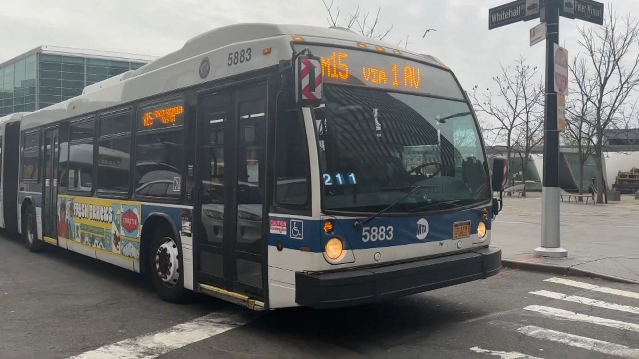 A blue, white and black M15 bus is pictured in Manhattan.