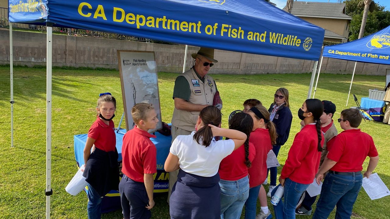 Huntington Beach Police and the California Department of Fish and Wildlife returned to throwing a local annual youth fishing event (Spectrum News/William D'Urso)