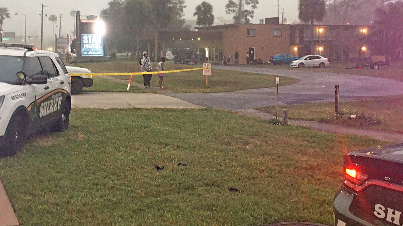 Deputies with the Osceola County Sheriff's Office were at the Lake Cecile Inn & Suites in Kissimmee after the hotel caught fire on Tuesday morning. (Asher Wildman/Spectrum News 13)