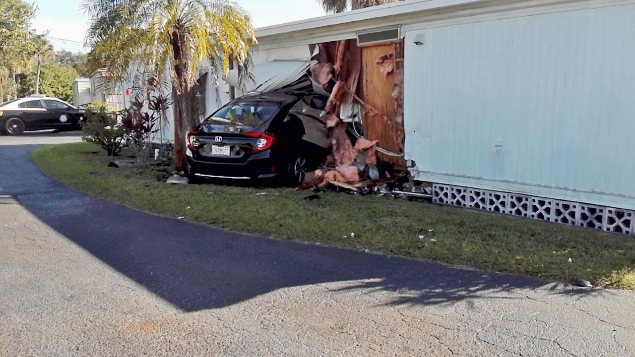 This 2019 Honda 4-door car on the southbound U.S. 301 when it veered off the right side of the roadway and crashed into a home at Highway Shores Mobile Home Park, stated officials. (Florida Highway Patrol)