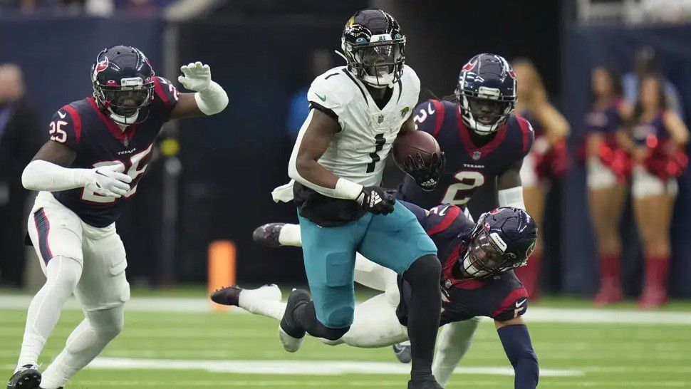  HOUSTON With so much at stake next week it would have been easy for the Jacksonville Jaguars to bypass the lowly Houston Texans on Sunday It was clear from the start that they weren t expecting their showdown with the Tennessee Titans for the AFC South crown Travis Etienne rushed for 108 yards and a touchdown before halftime Tyson Campbell returned a fumble for a score and the Jaguars snapped a nine game skid against Houston by crushing the Texans 31 3 for their fourth straight victory overall Jacksonville 8 8 ranks first in the AFC South and would win the division for the first time since 2017 with a home win over Tennessee next Sunday in the regular season finale The Titans 7 9 have lost six in a row It was a unique situation in a game that sure might not have meant much coach Doug Pederson said I don t think I ve ever been in a situation where you have a game like this going into a game for everything I tell you it s a credit to the guys in the locker room the coaches just to stay focused Trevor Lawrence passed for 152 yards but played just one possession in the second half and Etienne didn t carry the ball after halftime as the Jaguars won 28 3 in what would be the team s first victory over Houston since 2017 It was a great win for us Lawrence said Lots of distractions around this week and knowing what s in store for next week and I thought we handle our business today The Jaguars led by 21 at halftime and Snoop Conner s 3 yard run made it 28 0 early in the third quarter The Texans 2 13 1 snapped a nine game losing streak with a win over Tennessee last week but struggled in all areas Sunday against Jacksonville to keep them without a home win for the first time in Texans history the franchise When you play like that it s not going to happen We re not going to win said coach Lovie Smith So there s nothing more to say about that Davis Mills passed for 202 yards but was unable to get the Texans into the end zone and fumbled which Campbell returned for a touchdown Veteran receiver Brandin Cooks was surprised the team played so poorly on Sunday after looking much better in recent weeks Definitely he said Just because I feel like we had that drive There has definitely been progress So to come here and go back to what we were doing at the beginning of the season is definitely disappointing Houston was stopped on fourth and 1 from their 45 yard line on the first possession to give Jacksonville great field position on their first drive The Jaguars took a 7 0 lead when JaMycal Hasty scored on a 5 yard run Jacksonville made it 14 0 when Etienne ran 62 yards for a touchdown early in the second quarter Rookie Jalen Pitre had a shot to stop him at the line but he missed the tackle and Etienne simply blasted past the rest of the Houston defenders to score When I broke up there was no one there It felt really cool to be out there and start running said Etienne The defense got on the scoreboard when Josh Allen sacked Mills on Houston s next possession and forced a fumble that Campbell picked up and returned 12 yards for a touchdown to make it 21 0 It was the first touchdown of his career Desmond King intercepted Lawrence after that but the Texans came up empty when Mills threw an incompletion on fourth and 5 from the 10 yard line Houston finally got on the scoresheet when Ka imi Fairbairn s 56 yard field goal made it 28 3 with about six minutes left in the third quarter Riley Patterson extended the lead to 31 3 with a 53 yard field goal with about six minutes remaining CJ Beathard took over after Lawrence came out and threw for 29 yards and was intercepted by Pitre who leads the Texans with five interceptions this season Credit https www mynews13 com fl orlando sports 2023 01 02 jacksonville jaguars keep rolling houston texans 