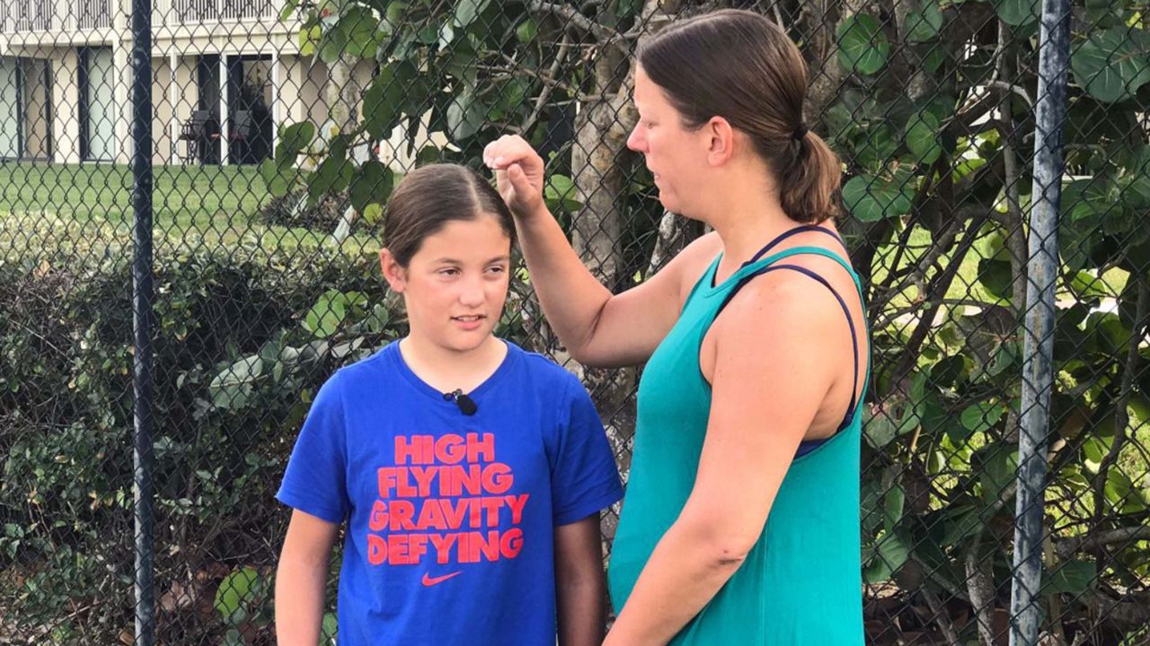 Angelina Marsella, 9, was on vacation with her family in Cocoa Beach when she helped save an 87-year-old man, who was having a medical issue. (Greg Pallone/Spectrum News 13)
