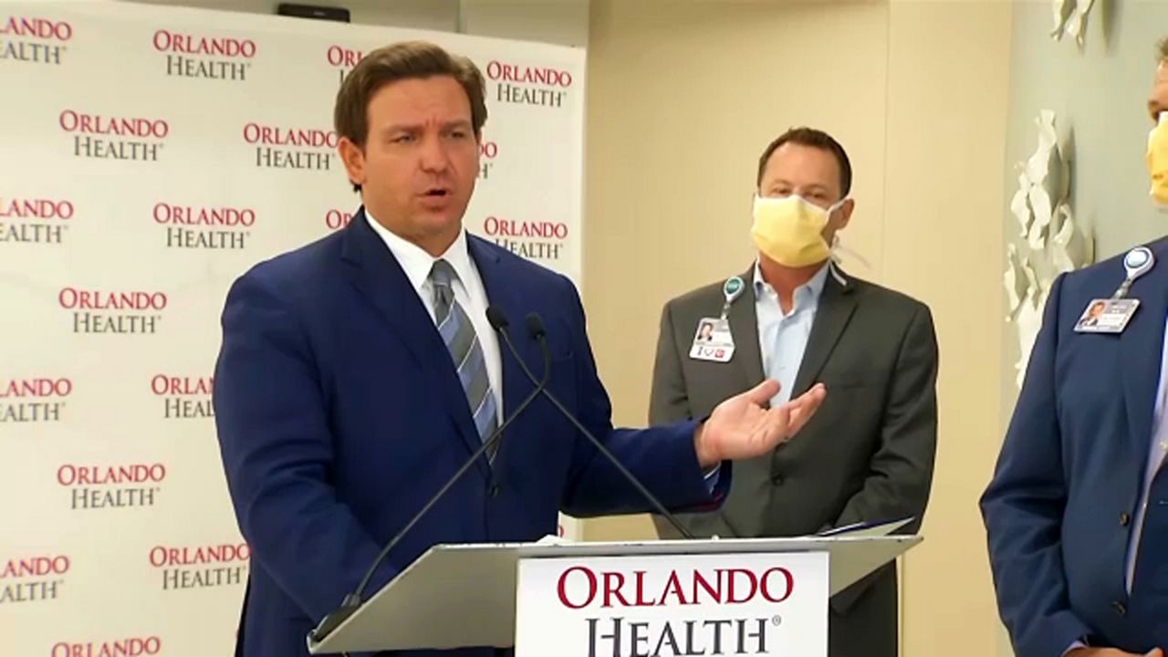 Florida Gov. Ron DeSantis speaks from Orlando Health South Seminole Hospital in Longwood on Monday. He spelled out new efforts by the state to get the vaccine to more people. (Arnie Girard/Spectrum News)