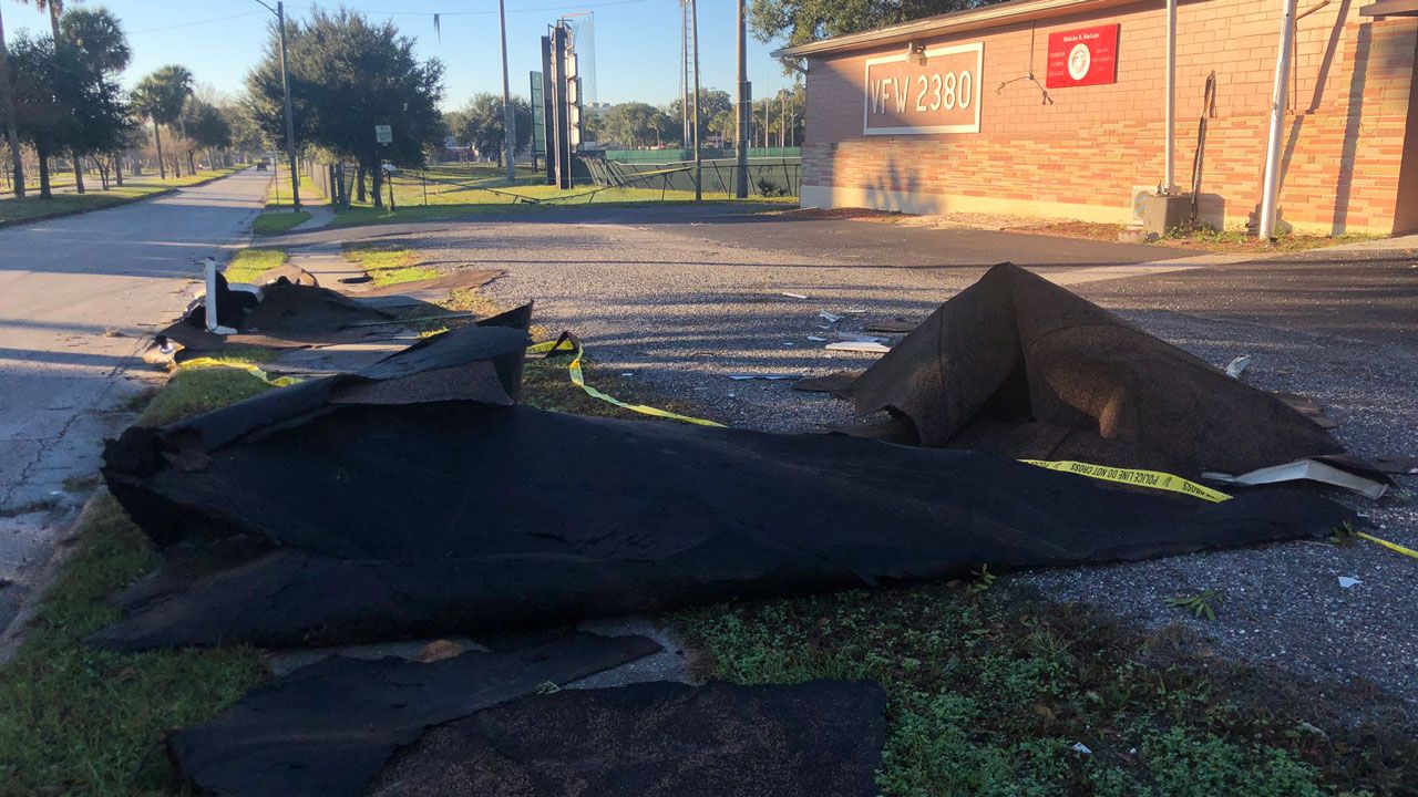 A piece of debris from the DeLand VFW's roof after a now-confirmed tornado hit the area on Saturday. (Nicole Griffin, Spectrum News)