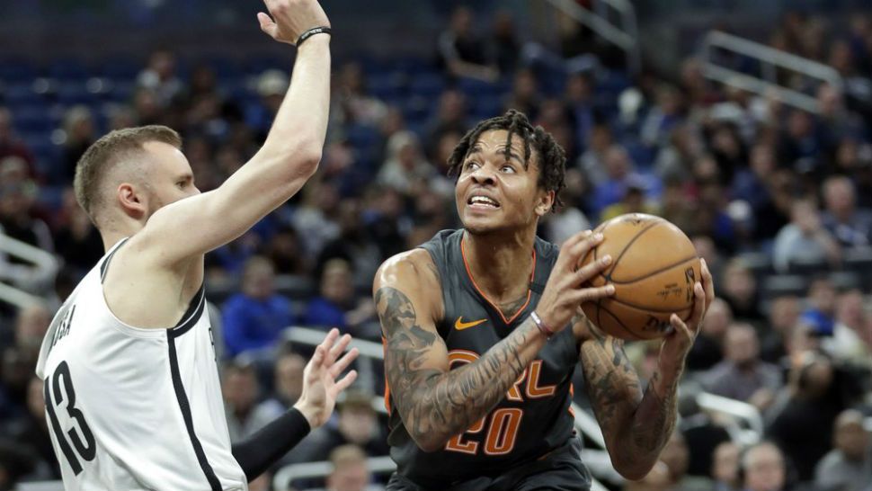 Orlando Magic guard Markelle Fultz, right, looks for a shot against Brooklyn Nets guard Dzanan Musa during the first half of an NBA basketball game, Monday, Jan. 6, 2020, in Orlando, Fla. (AP Photo/John Raoux)