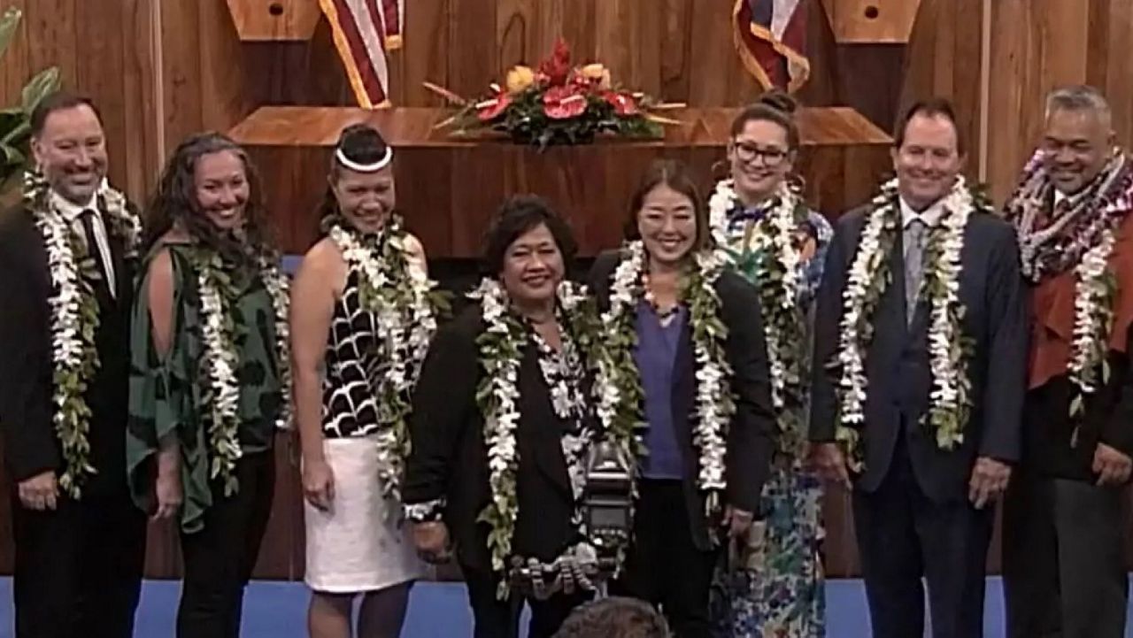 Eight Maui County Council members were sworn in on Jan. 3. The one remaining seat remains open pending a Hawaii Supreme Court decision. (Maui County Council)
