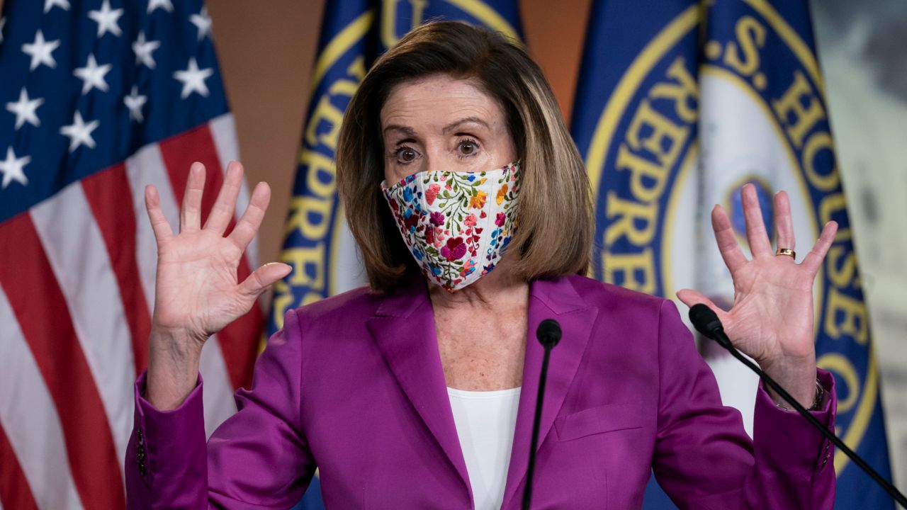 Speaker of the House Nancy Pelosi (D-Calif.) holds a news conference on the day after violent protesters loyal to President Donald Trump stormed the U.S. Congress. (J. Scott Applewhite/AP)