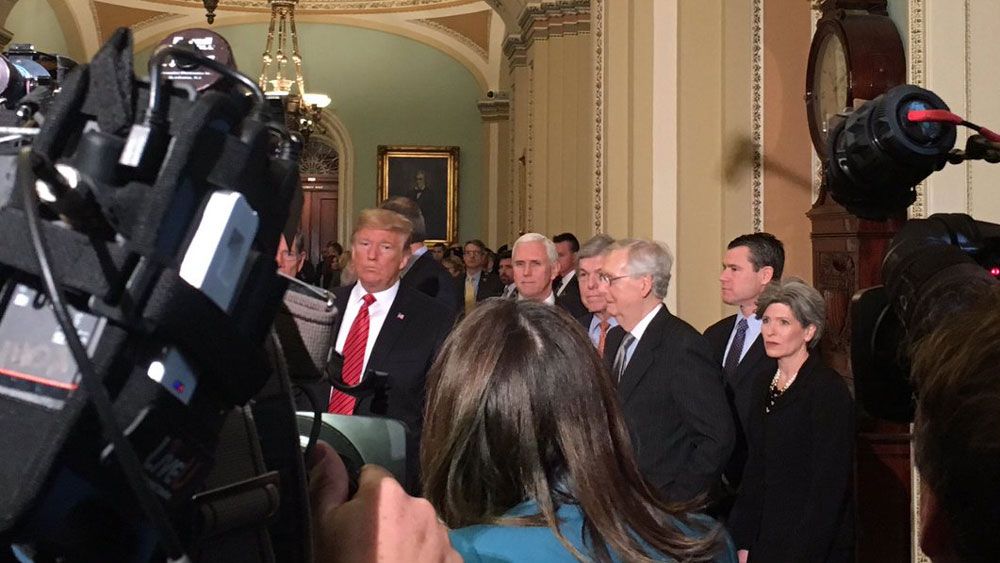 President Trump emerges from a meeting with Republicans on Capitol Hill Wednesday. He met with Democrats at the White House later in the day. (Spectrum News DC)
