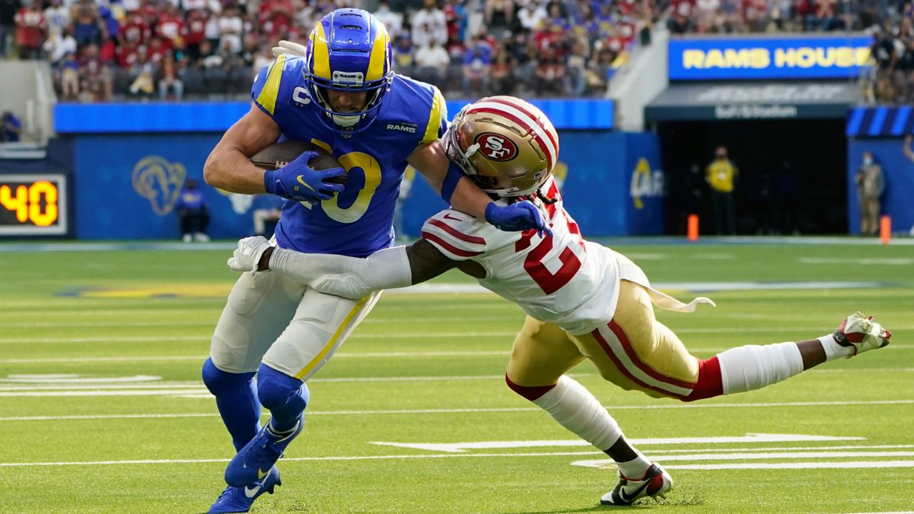 San Francisco 49ers defensive back Dontae Johnson (27) tackles Los Angeles Rams wide receiver Cooper Kupp (10) during the first half of an NFL football game Sunday, Jan. 9, 2022, in Inglewood, Calif. (AP Photo/Marcio Jose Sanchez)