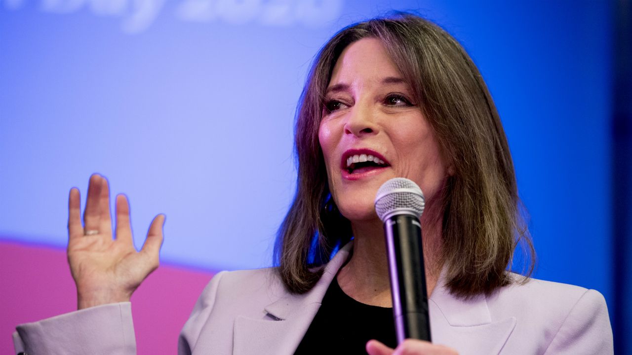 Marianne Williamson speaks at a forum called "Faith, Politics and the Common Good" at Franklin Junior High School on Thursday in Des Moines, Iowa. She suspended her presidential campaign Friday. (Andrew Harnik/AP)