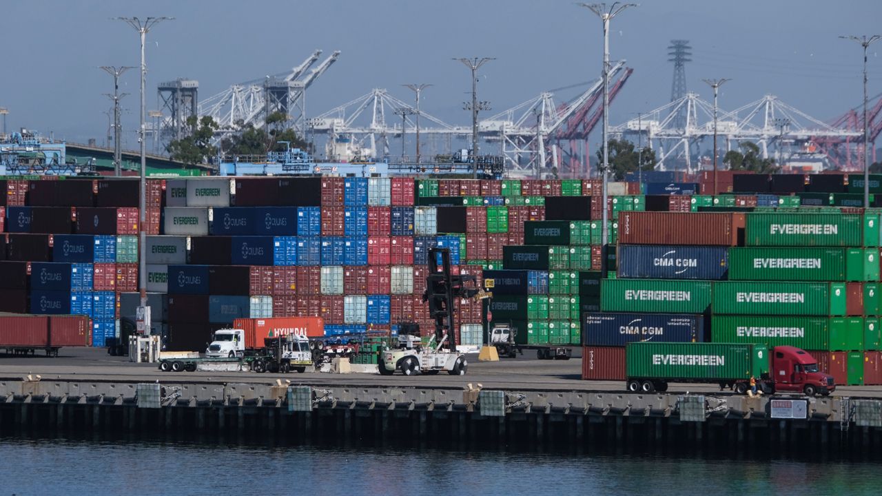 Cargo containers sit stacked at the Port of Los Angeles, Oct. 20, 2021 in San Pedro, Calif. (AP Photo/Ringo H.W. Chiu)