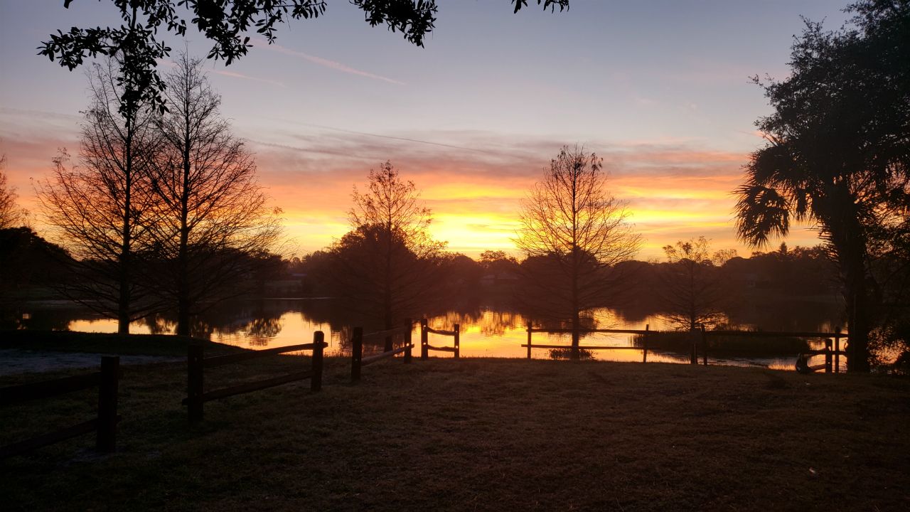 Sent to us with the Spectrum News 13 app: The sun rises over a serene Dew Drop Park in Casselberry on Monday. (Dawn Payne/viewer)