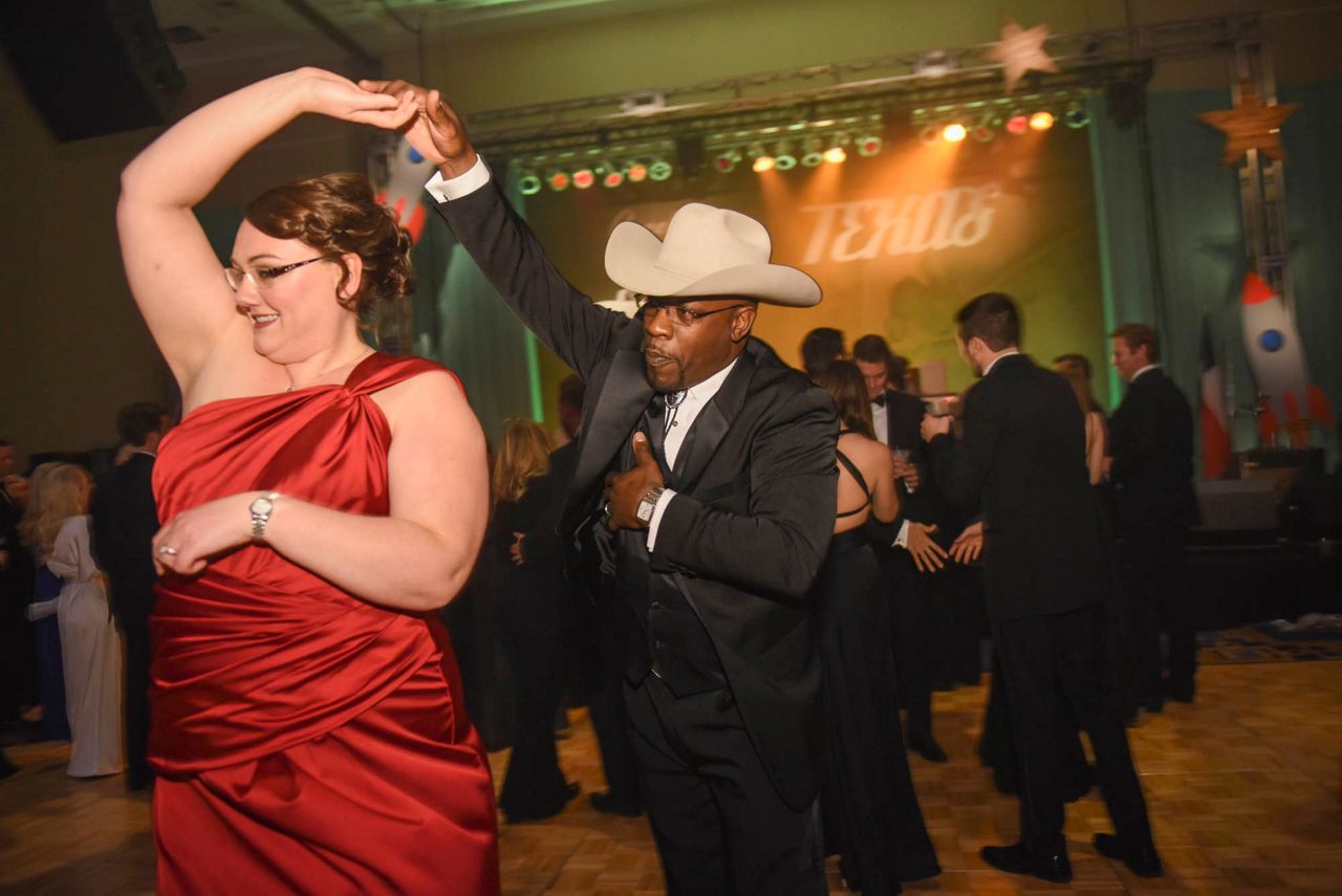 People on the dance floor at a previous Texas Black Tie and Boots Inauguration Ball. (AP Image/File)