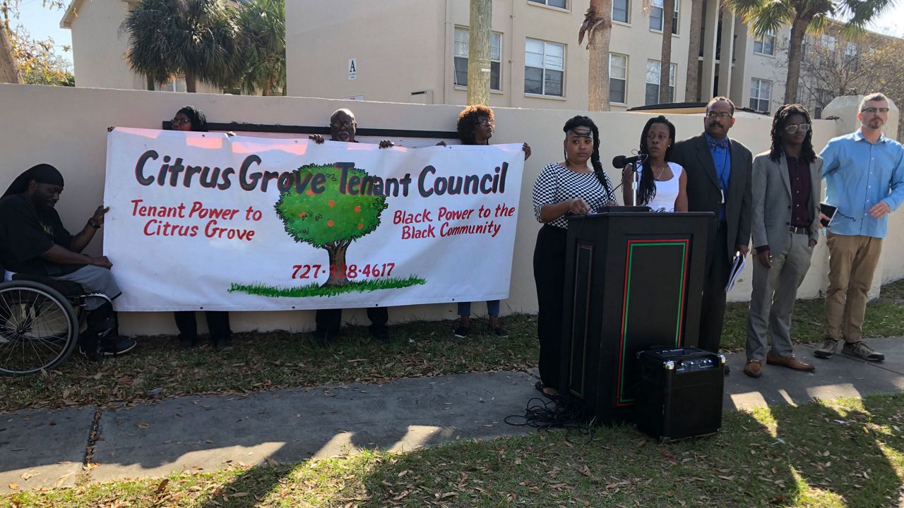 Resident members of the Citrus Grove Tenant Council speak to assembled media, Thursday, January 16, 2020. (Trevor Pettiford/Spectrum Bay News 9)