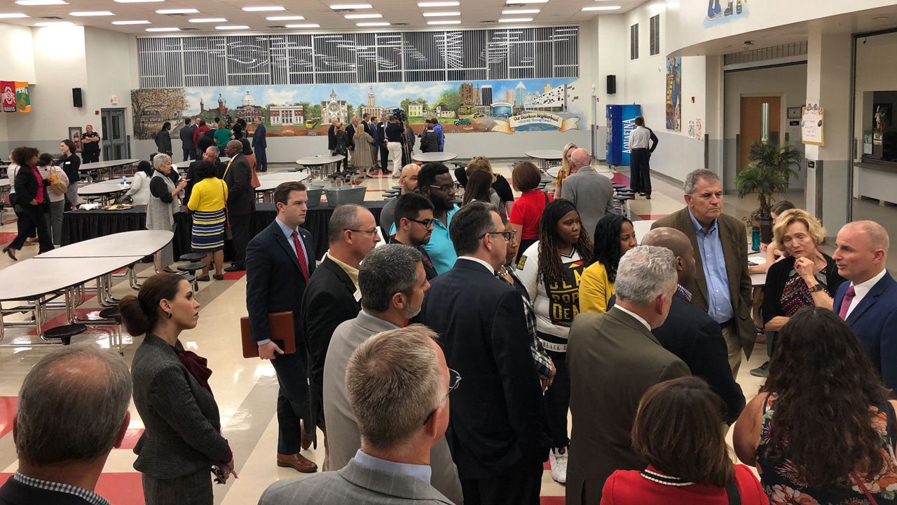 The finalists in Hillsborough County Schools' search for its next superintendent meet with members of the public inside the cafeteria at Rampello Downtown Elementary in Tampa, Thursday, January 16, 2020. (Laurie Davison/Spectrum Bay News 9)