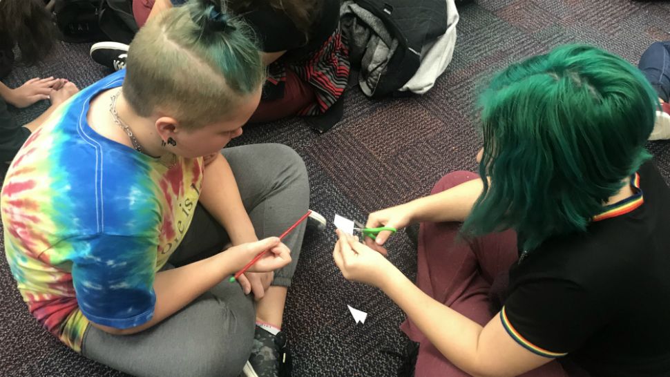 Students at Central Middle School in West Melbourne on Wednesday learned how to make tiny "rockets" out of ordinary household items. (Greg Pallone/Spectrum News 13)