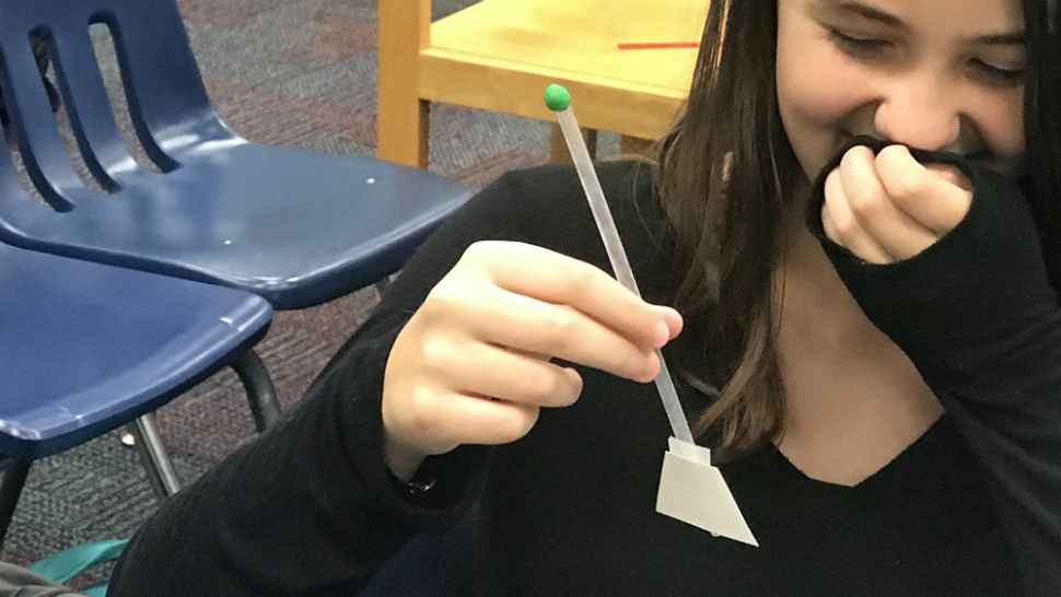 Students at Central Middle School in West Melbourne on Wednesday learned how to make tiny "rockets" out of ordinary household items. (Greg Pallone/Spectrum News 13)