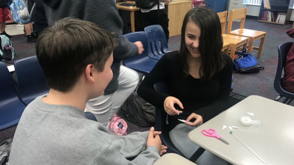 Students at Central Middle School in West Melbourne on Wednesday learned how to make tiny "rockets" out of ordinary household items. (Greg Pallone/Spectrum News 13)