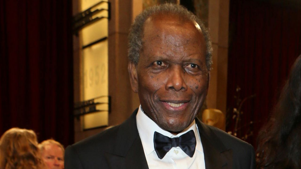 Sidney Poitier arrives at the Oscars on Sunday, March 2, 2014, at the Dolby Theatre in Los Angeles. (Photo by Alexandra Wyman/Invision/AP)