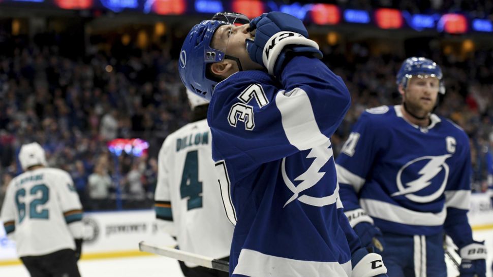 Tampa Bay Lightning center Yanni Gourde (37) celebrates his second period goal during an NHL hockey game against the San Jose Sharks, Saturday, Jan. 19, 2019, in Tampa, Fla. (AP Photo/Jason Behnken)