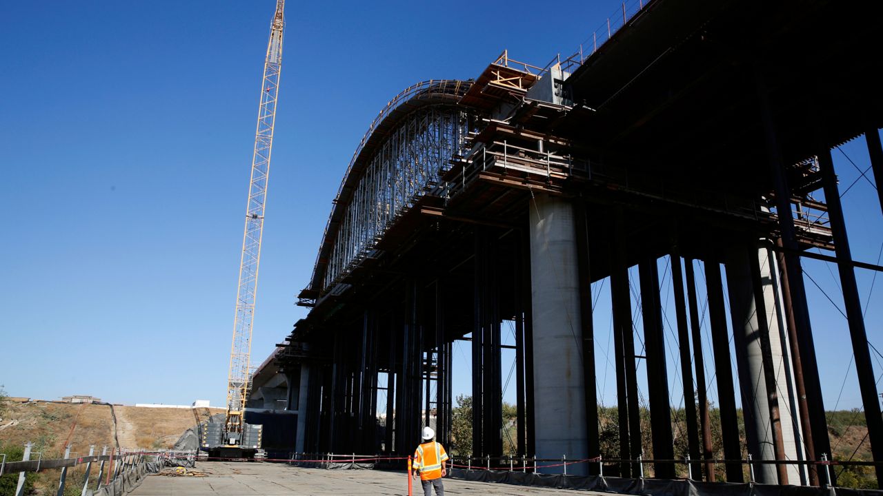 This Oct. 9, 2019, file photo shows the high speed rail viaduct under construction over the San Joaquin River near Fresno, Calif. (AP Photo/Rich Pedroncelli, File)