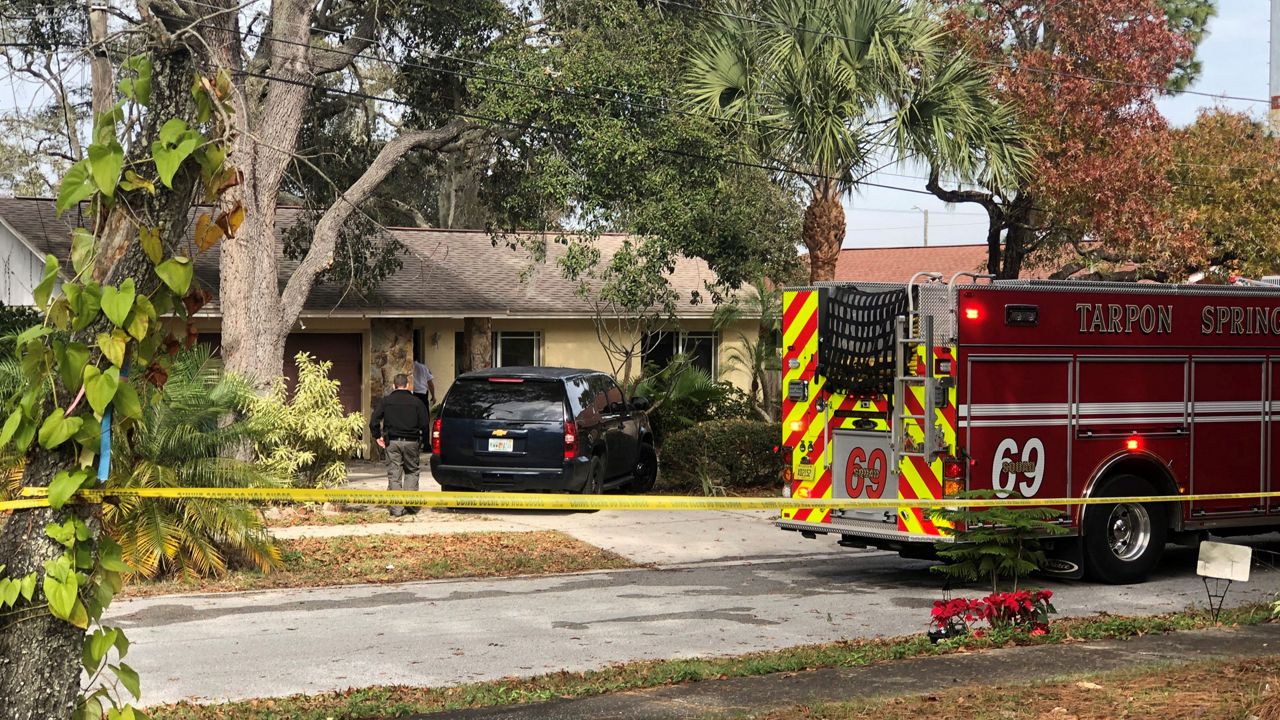 The fire broke out just before 12:30 p.m. Thursday in the 700 block of East Locust Street. (Trevor Pettiford/Spectrum Bay News 9)