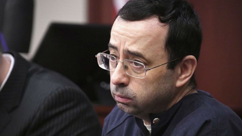 Larry Nassar looks at the gallery in the court during the sixth day of his sentencing hearing Tuesday, Jan. 23, 2018, in Lansing, Mich. Nassar has admitted sexually assaulting athletes when he was employed by Michigan State University and USA Gymnastics, which is the sport’s national governing organization and trains Olympians. (Dale G.Young/Detroit News via AP)