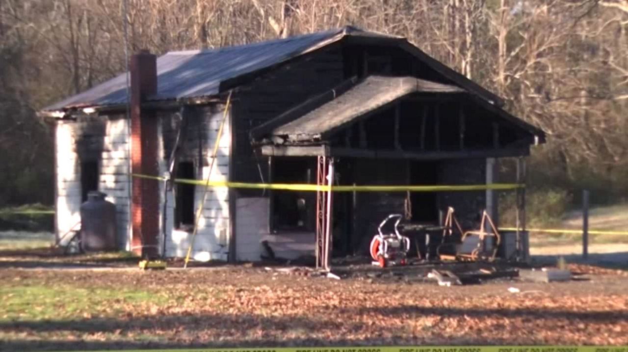 Neighbor, Firefighters Try to Save Woman from Burning Home