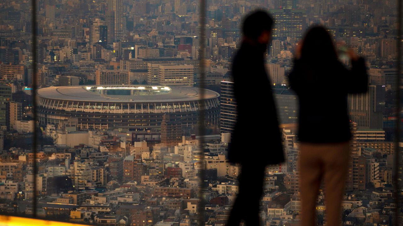 Japan National Stadium, where the opening ceremony of the 2021 Olympics and many other events are set to take place, is seen from a rooftop observation deck Thursday, January 21, 2021 in Tokyo. (Kiichiro Sato/AP file)