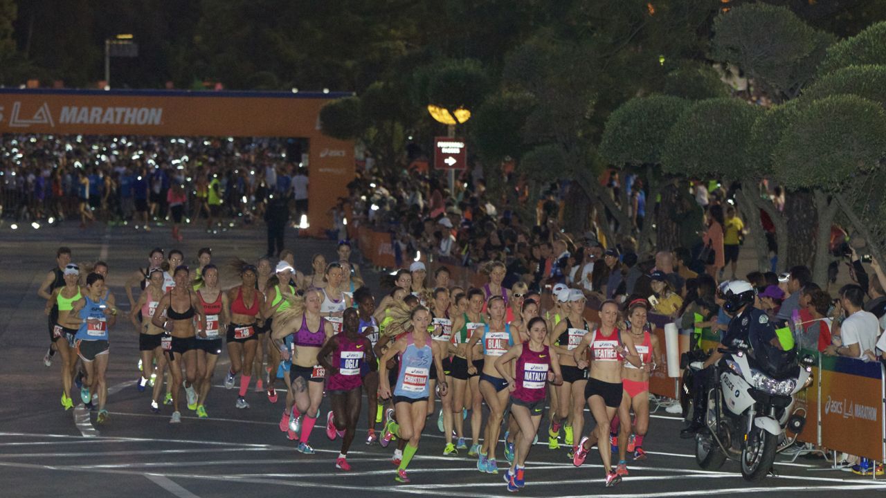 Women's elite runners start the 30th Los Angeles Marathon Sunday, March 15, 2015. The 26.2-mile event begins at Dodger Stadium and ends in Santa Monica, Calif. (AP Photo/Damian Dovarganes)