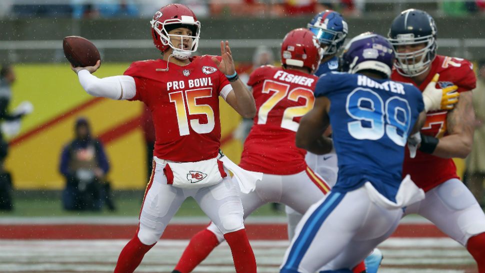 AFC quarterback Patrick Mahomes (15), of the Kansas City Chiefs, throws a pass against the NFC during the first half of the NFL Pro Bowl football game Sunday, Jan. 27, 2019, in Orlando, Fla. (AP Photo/Mark LoMoglio)