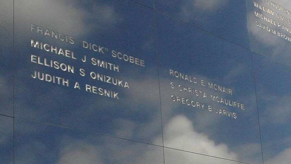 The names of the Challenger crew are etched on the Space Mirror, a memorial for NASA's fallen, at the Kennedy Space Center Visitor Complex. (NASA)