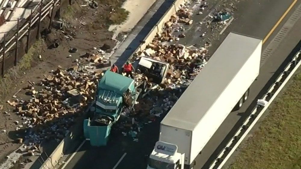 Three semi-trucks collided outside Jacksonville Tuesday, and one of them dumped a load of almond milk cartons on the highway. (CNN)