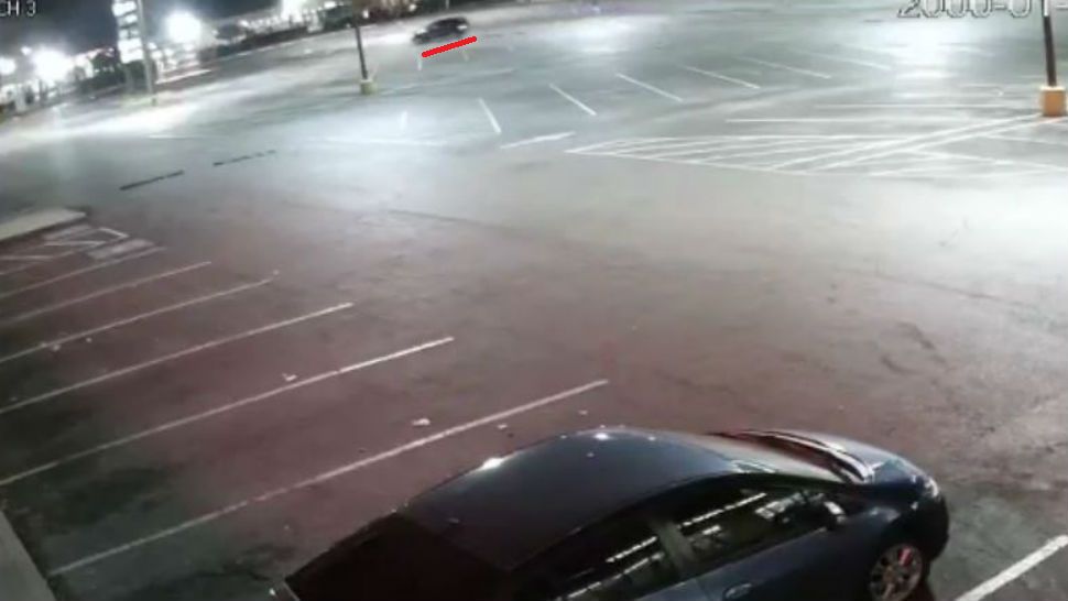 Screen grab from the surveillance video. APD is looking for information on the SUV. Watch the full video below.