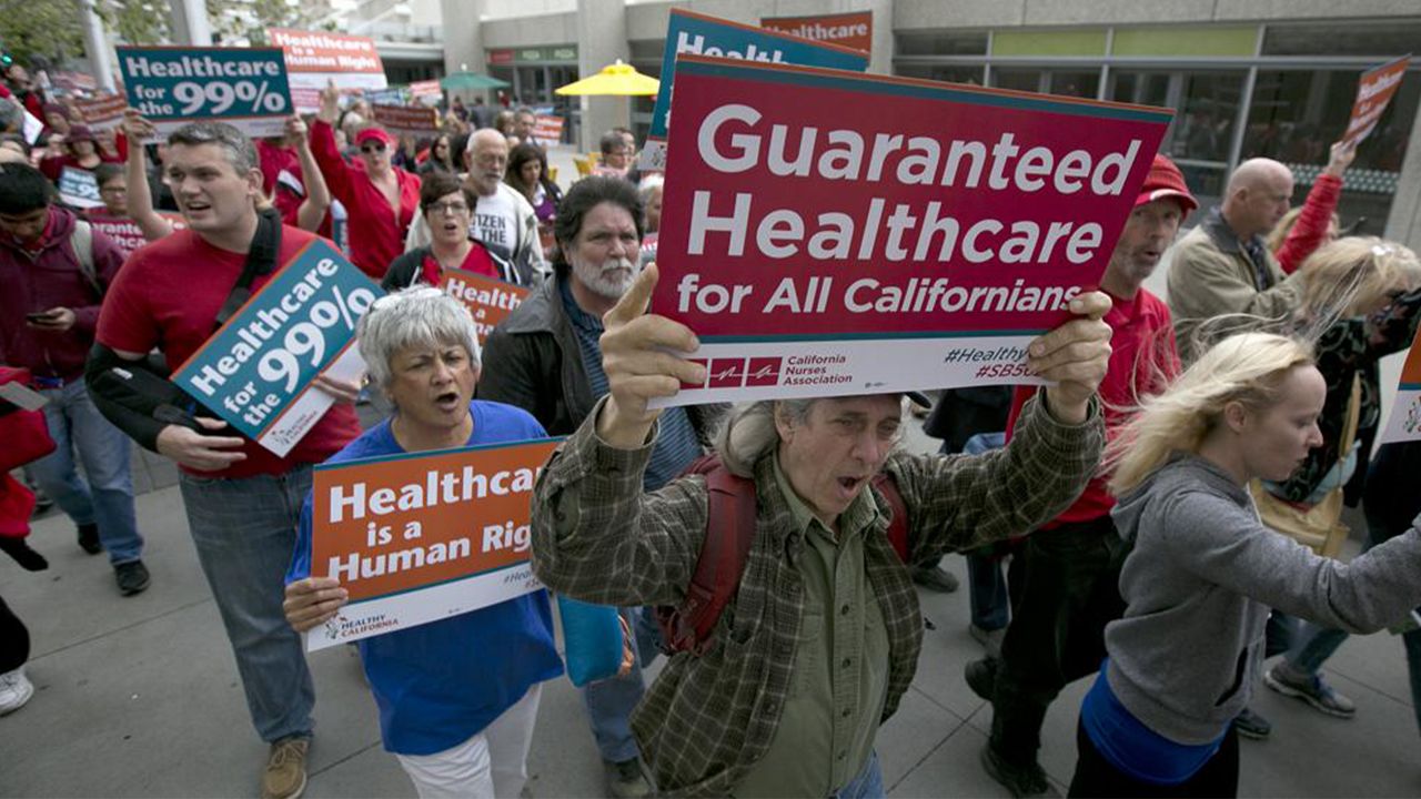 Supporters of single-payer health care march to the Capitol, April 26, 2017, in Sacramento, Calif. (AP Photo/Rich Pedroncelli, File)