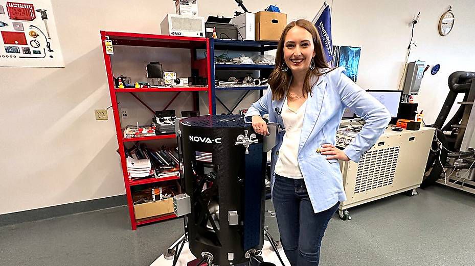 Taylor Yow, a graduate student at Embry-Riddle Aeronautical University, is one of the team members to design the camera and technology that will take photos of the upcoming landing. (Spectrum News/Randy Rauch)