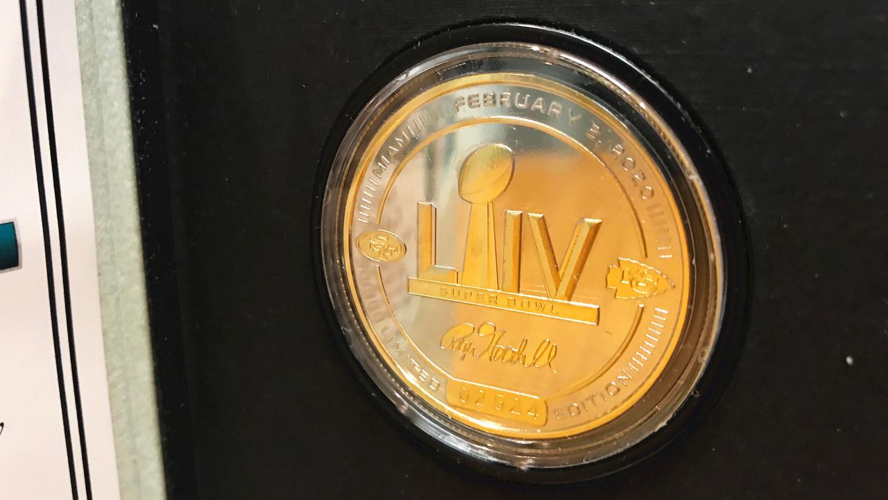 Highland Mint created the gold coin that will be used at the beginning of Super Bowl LIV. (Greg Pallone/Spectrum News 13)