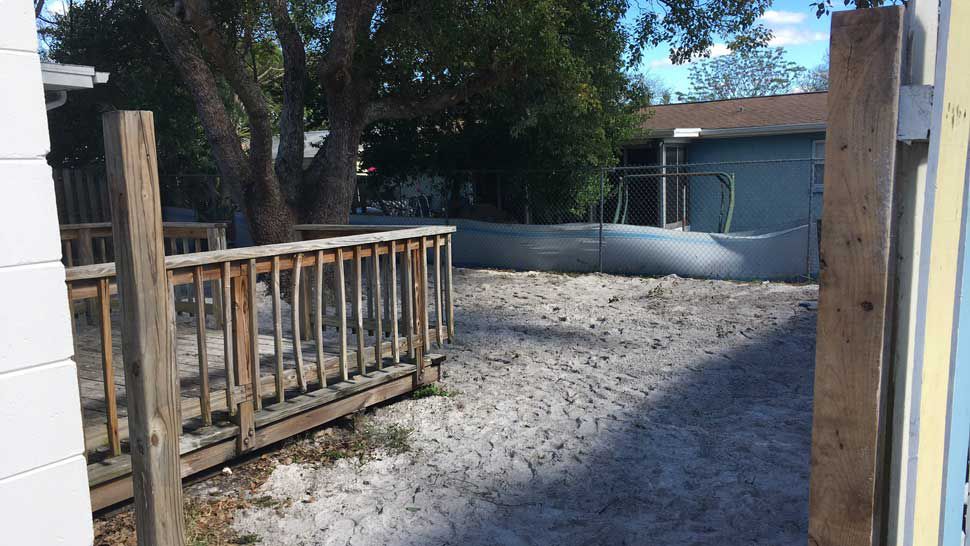 Backyard of home involved in Tarpon Springs murder investigation